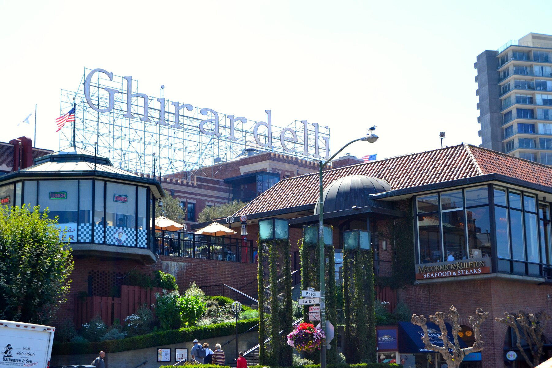 Ghirardelli Square sign and brick buildings in San Francisco.